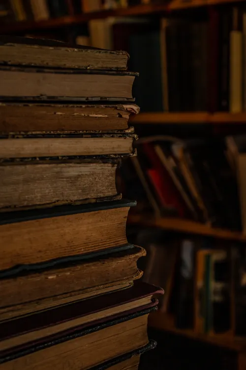 A stack of old books in a library
